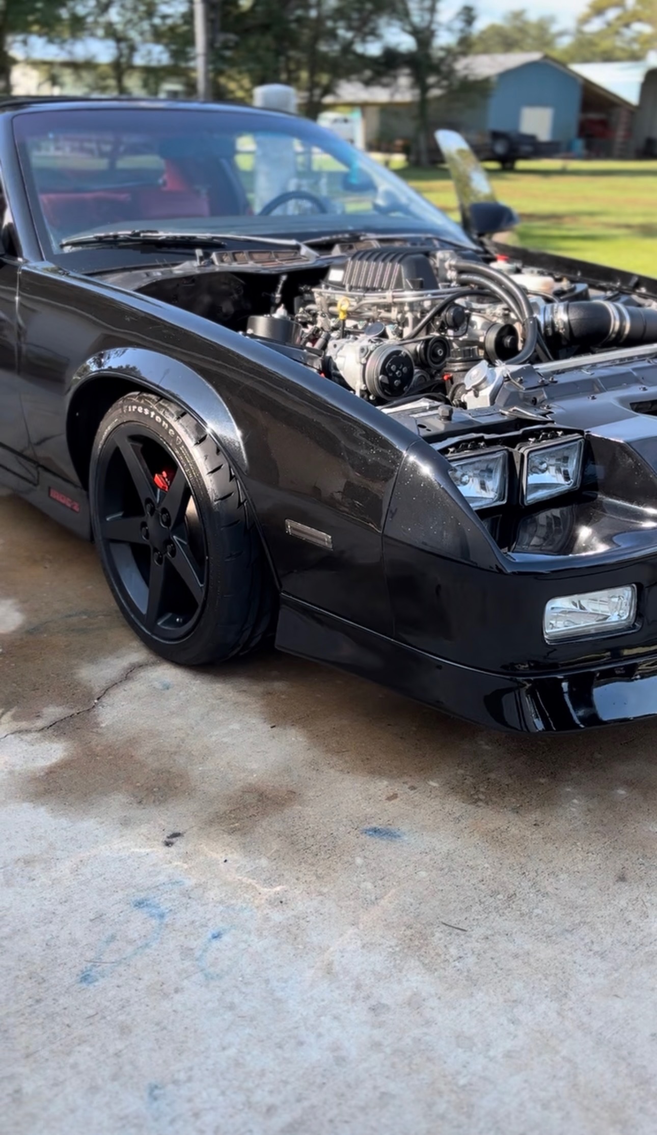 Professional engine bay cleaning during a mobile detailing service in Baton Rouge, LA