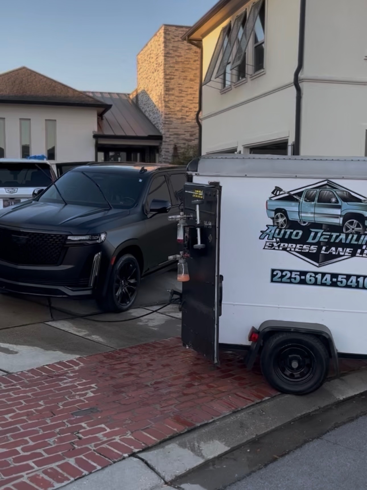 Auto Detailing Express Lane mobile detailing truck and trailer at a Baton Rouge customer’s home