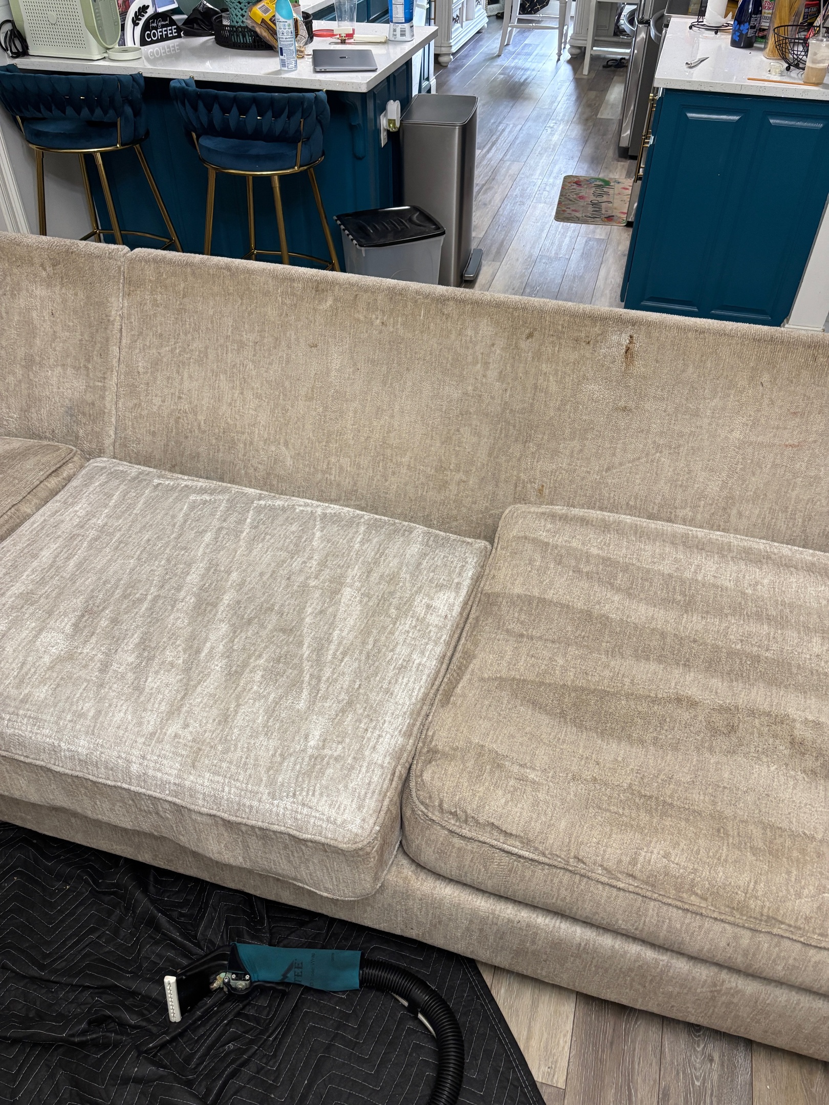 Close-up of refreshed gray upholstery fabric after professional furniture cleaning