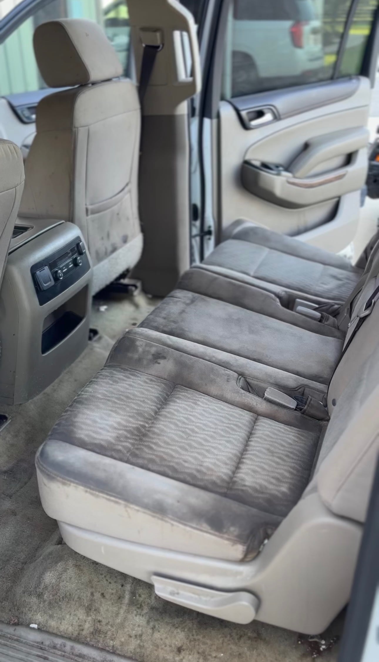 Dirty vehicle interior before professional mobile detailing in Baton Rouge, LA